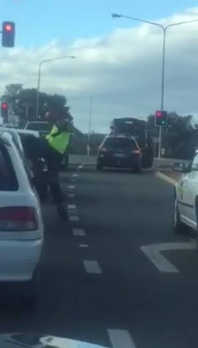 The man kicking Mr Mathew's car in a bout of road rage in Canberra. Photo: Supplied