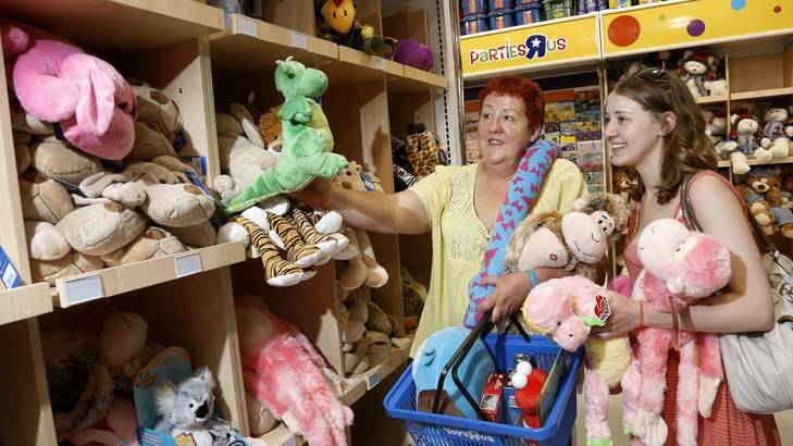 Noelle Pocknall with her daughter Amy Pocknall from Ngunnawal looking for some last minute gift items at Toys 'R' Us Majura Park. Photo: Jeffrey Chan