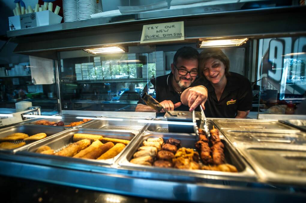 Hughes takeaway owners Peter and Nita Dorizas have been in the suburb for almost a decade and love it. Photo: Karleen Minney