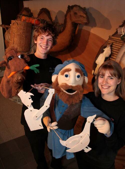 Canberra based puppeteer Jonathan Mettes and sister Marianne Mettes with puppets Mr Camel and Marco Polo. Today they performed the 'Goose that laid the Golden Egg' with stick puppets at the Silk Road exhibition at the National Museum of Australia. Photo: Jeffrey Chan