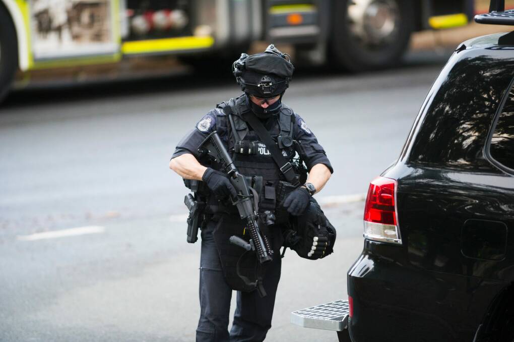 ACT Policing's Specialist Response Group is at the scene. Photo: Rohan Thomson