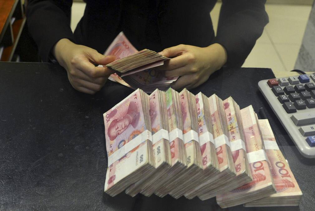 Nice little earner: Fluent Mandarin speakers will find an extra $13,000 in their pay packets. Photo: Reuters