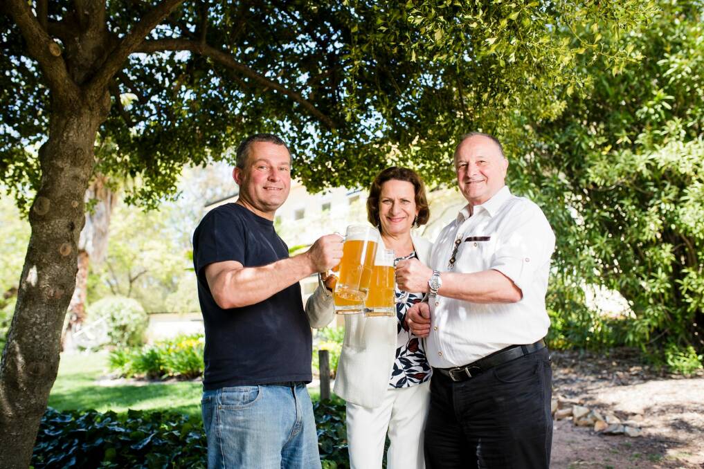 Prost! Owner of Zierholz Christoph Zierholz, head of administration at the Embassy of the Federal Republic of Germany Maria Friedrich-Boerger, and German foreign ministry Alfred Reichert.  Photo: Jamila Toderas