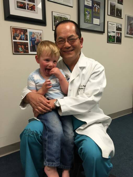Ollie Lanham and Dr T.S. Park who performed his surgery at St Louis Children's Hospital in Missouri. Photo: Supplied
