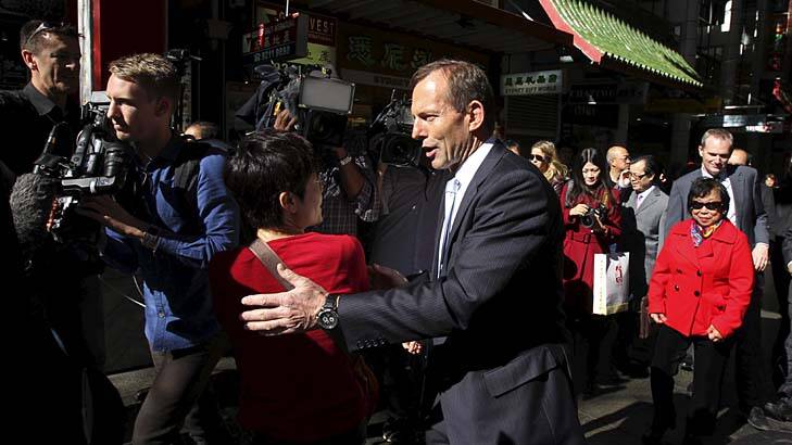 Just me: Tony Abbott had yum cha, held a media conference and did a meet and greet street walk through Chinatown on Sunday. Photo: Dean Sewell