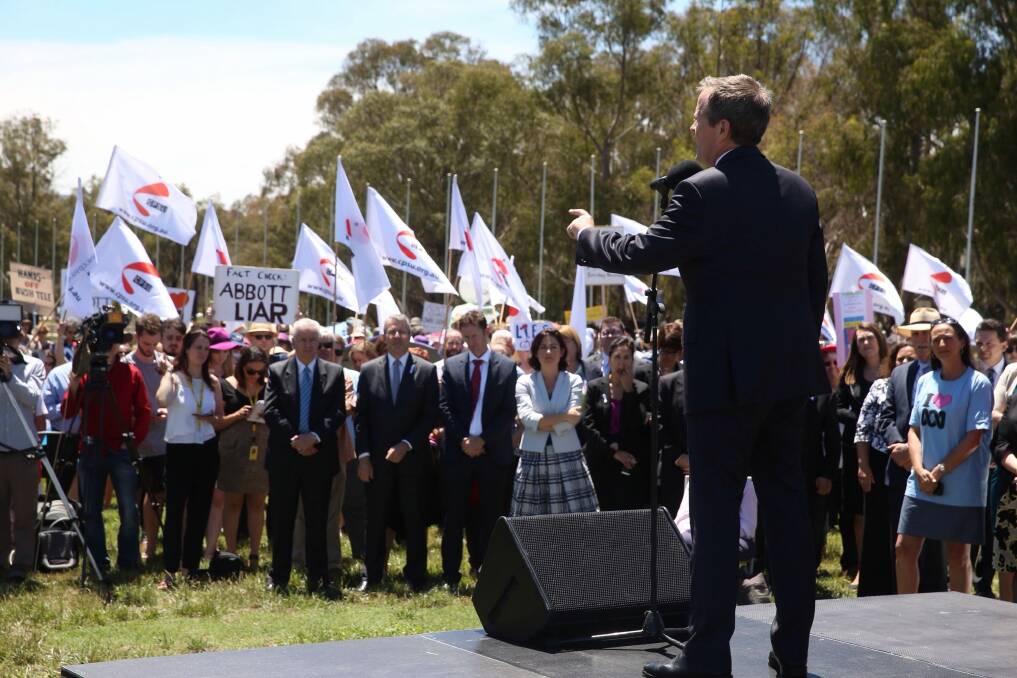 Opposition Leader Bill Shorten addresses the rally against ABC cuts outside Parliament House. Photo: Andrew Meares