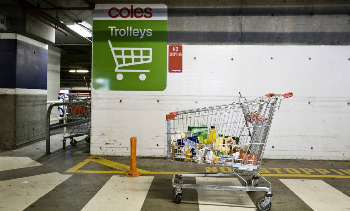 Coles is bringing trolley collection back in-house. Photo: Louie Douvis
