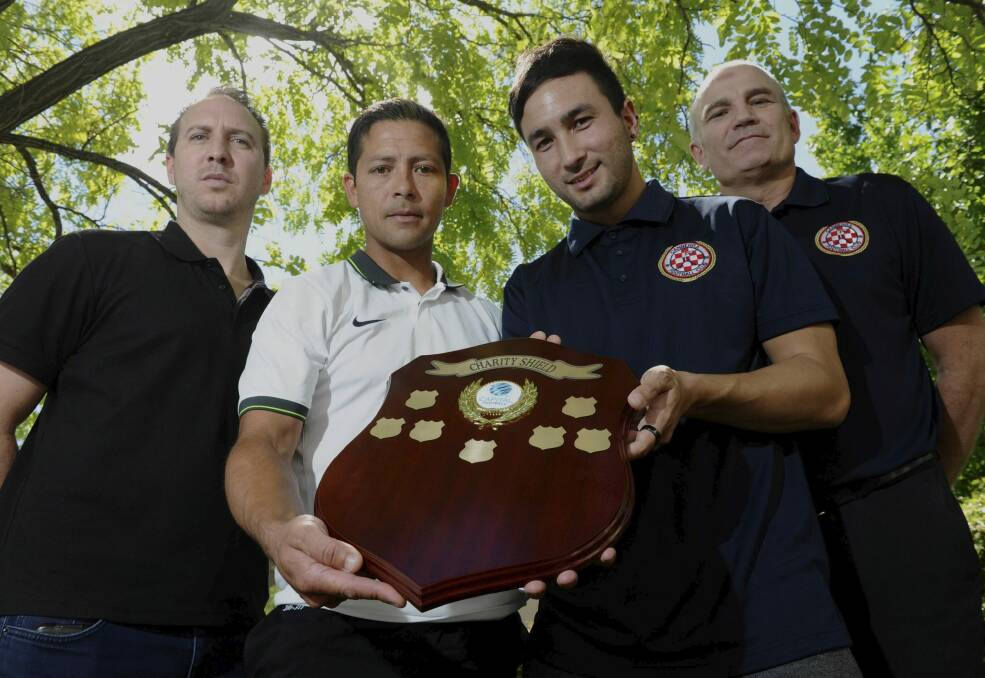 Gungahlin United coach Mitch Stevens and player Marcel Munoz, and Canberra FC captain Aidan Brunskill and coach Zoran Glavinic will be competing for the inaugural Capital Football charity shield on Friday night. Photo: Graham Tidy