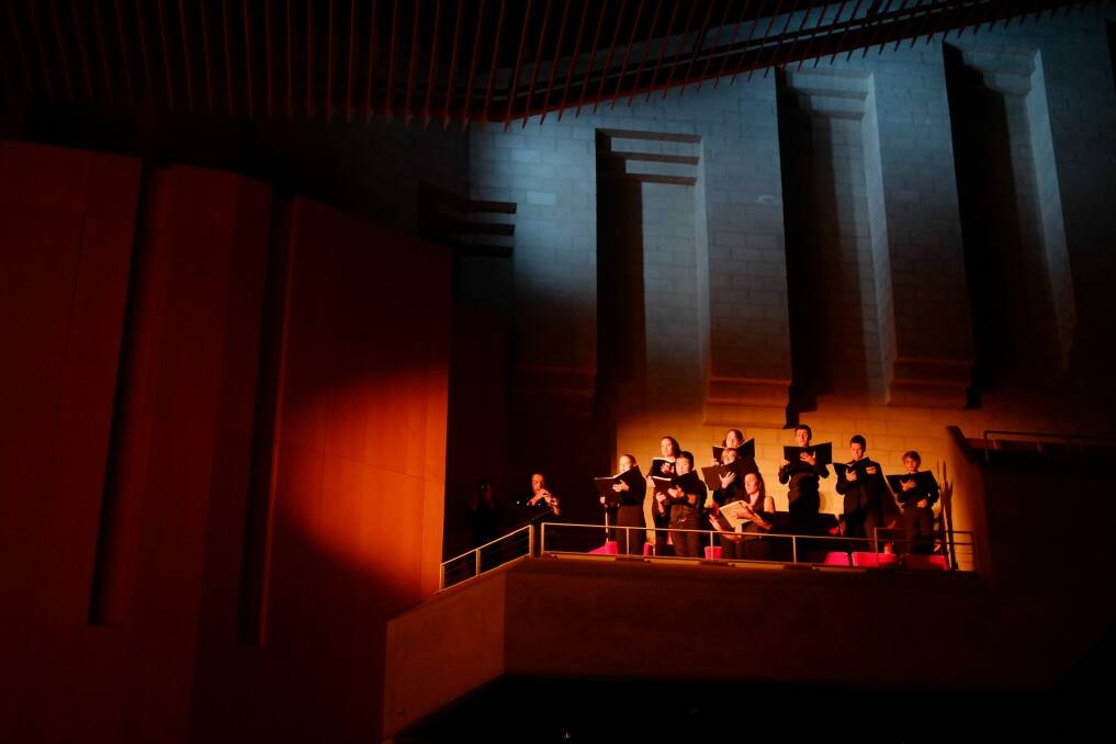 The Gallery Choir appearing to float near the ceiling.  Photo: Hou Leong