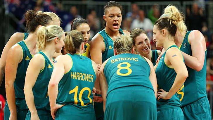 Standing tall ... the Opals celebrate after defeating Russia. Photo: Getty Images