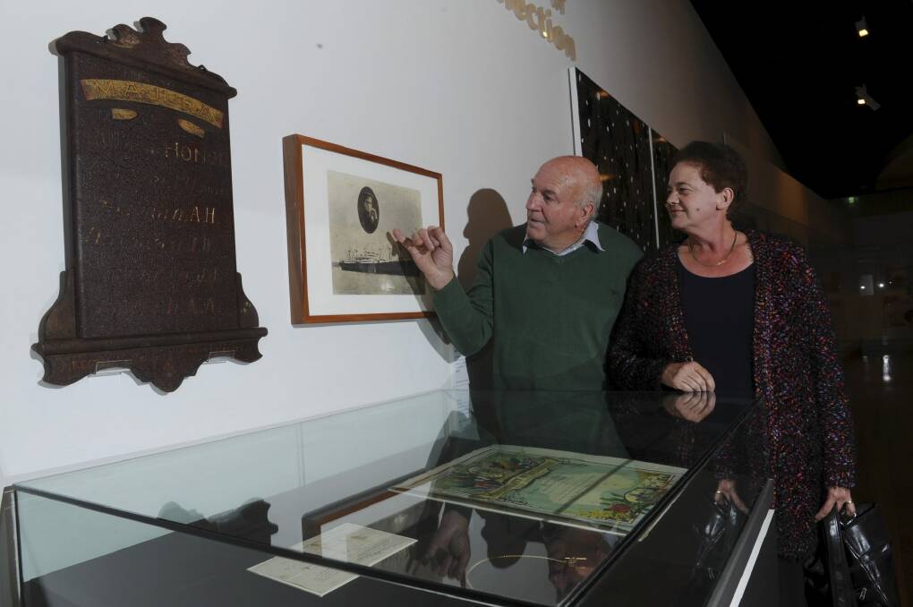 Kevin and Sue McIntosh, relatives of Arnold Arthur McIntosh, admire some of the artefacts they handed over to the gallery on Thursday. Photo: Graham Tidy