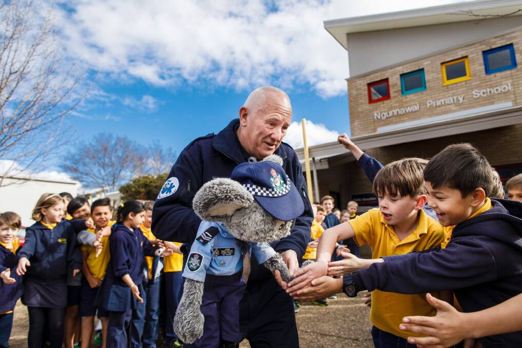 It was an emotional farewell this week for Constable Kenny Koala who said goodbye to his long-time friend and handler Stewart Waters. Photo: Sitthixay Ditthavong