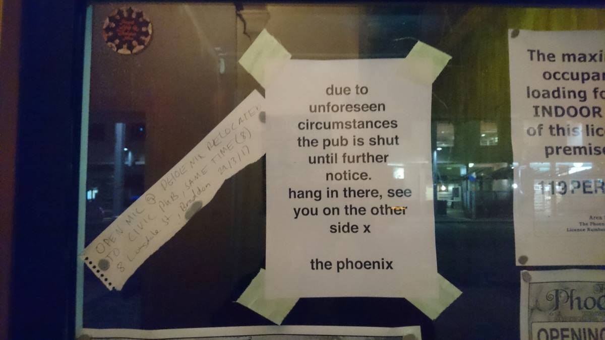 The notice taped to the window of the popular Phoenix bar on East Row. Photo: Supplied