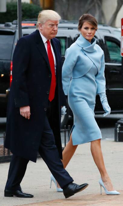 Donald Trump and his wife Melania arrive for a church service at St. John's Episcopal Church across from the White House in Washington before he was sworn in as president. Photo: ALEX BRANDON