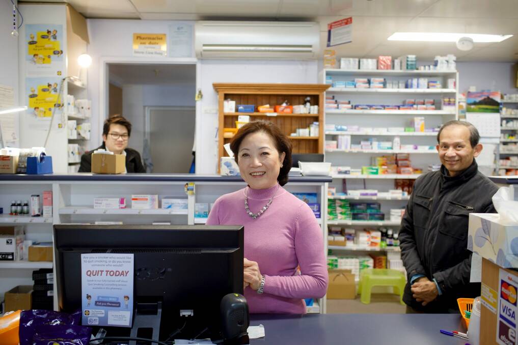 Liem, Kim, and Tan Dang are trying to stay positive about the future of the Narrabundah Pharmacy despite growing pressure from competitors. Photo: Sitthixay Ditthavong