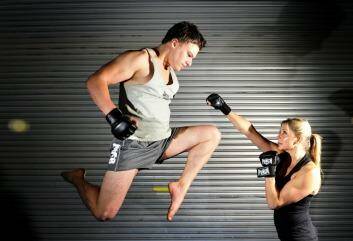 Public servant Chris Goldrick and school teacher Rachel Head will compete in  the professional MMA events scheduled in the ACT in 2014. Photo: Melissa Adams