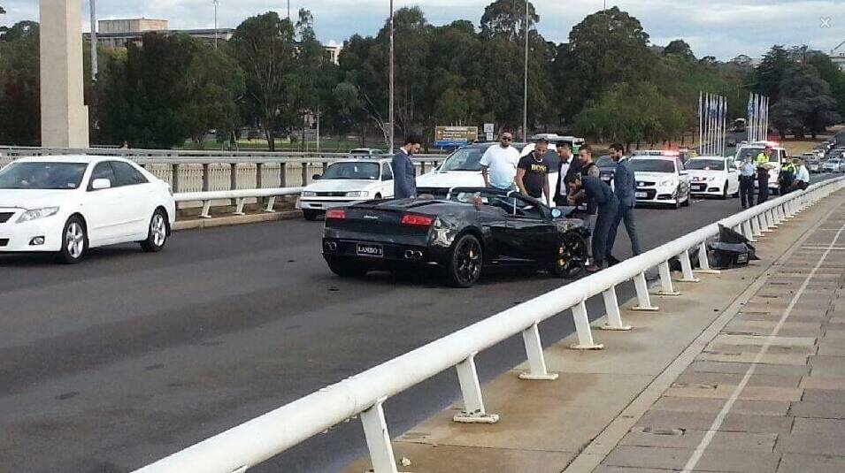Police blocked parts of Commonwealth Avenue Bridge after the smash on Easter Sunday. The black Lamborghini was decorated with ribbons for a wedding. Photo: Facebook