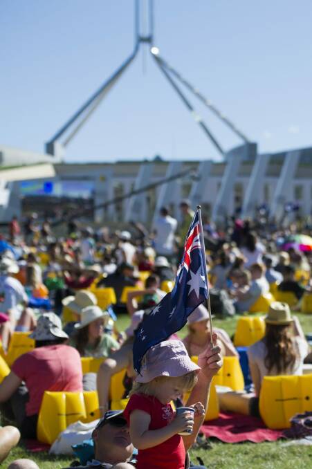 Thousands of people flocked to the lawns of Parliament House for the Australia Day Concert in 2015. 