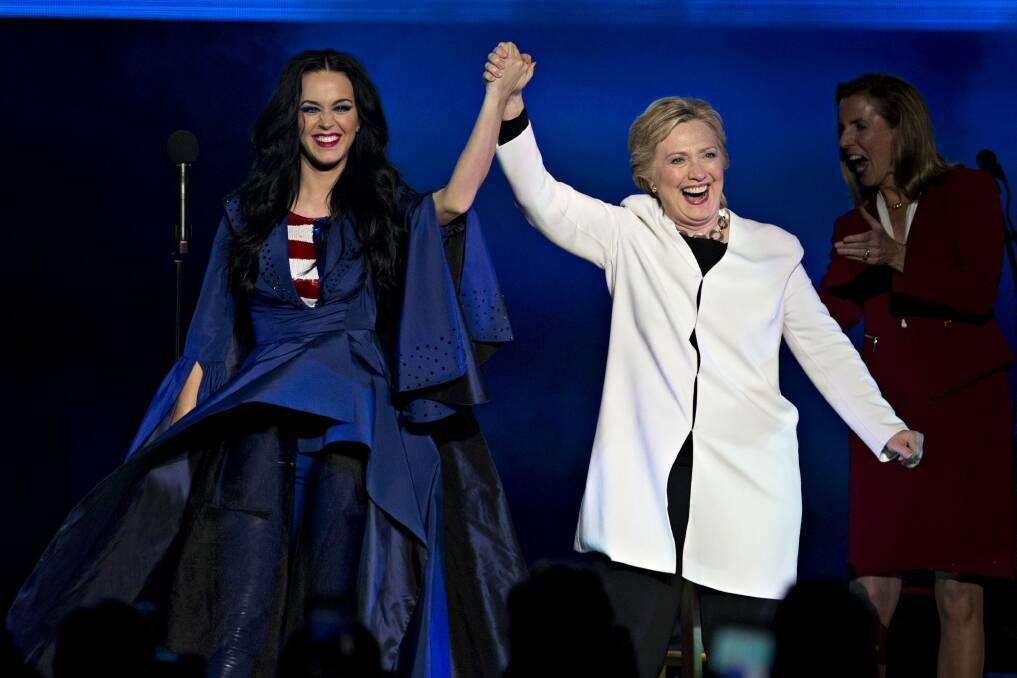 Hillary Clinton wore white when she appeared with her biggest celebrity fan and supporter Katy Perry during a campaign event in Philadelphia on Saturday. Photo: Daniel Acker