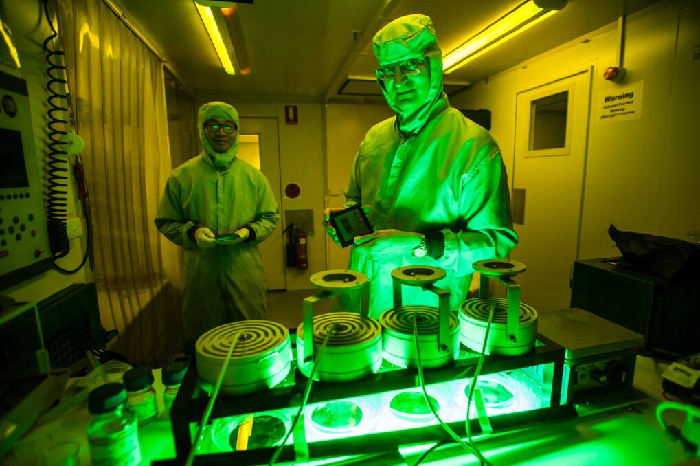 Associate professors Duk Choy and Steve Madden in their ANU laboratory.  Photo: Elesa Kurtz