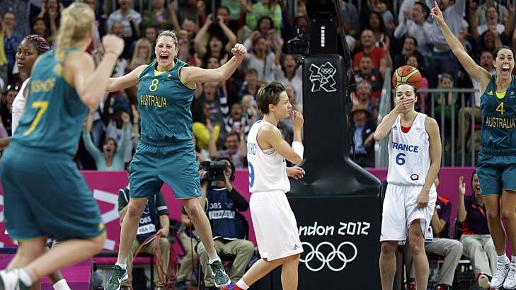 Australia's Suzy Batkovic (8) and Jenna O'Hea (4) celebrate after Belinda Snell's shot. Photo: AP