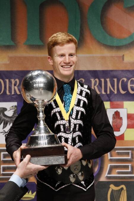 Canberra Irish dancer Conor Simpson receiving his award at the world championships in April this year. Photo: supplied