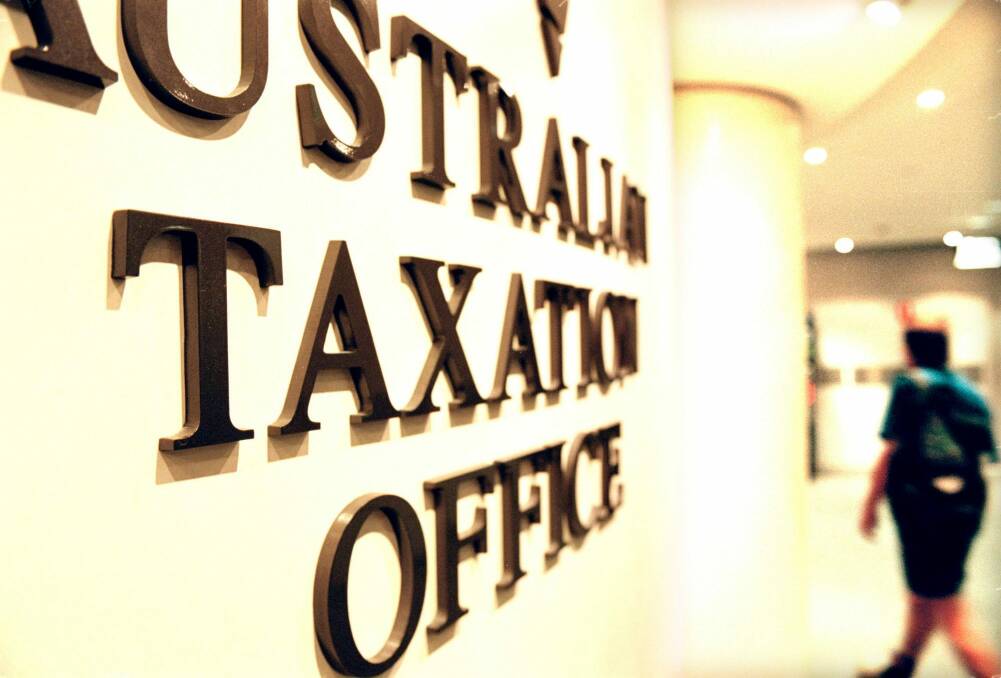 The Tax Office is fighting with the Australian Services Union over a trial of hot-desking at two offices. Photo: Louie Douvis
