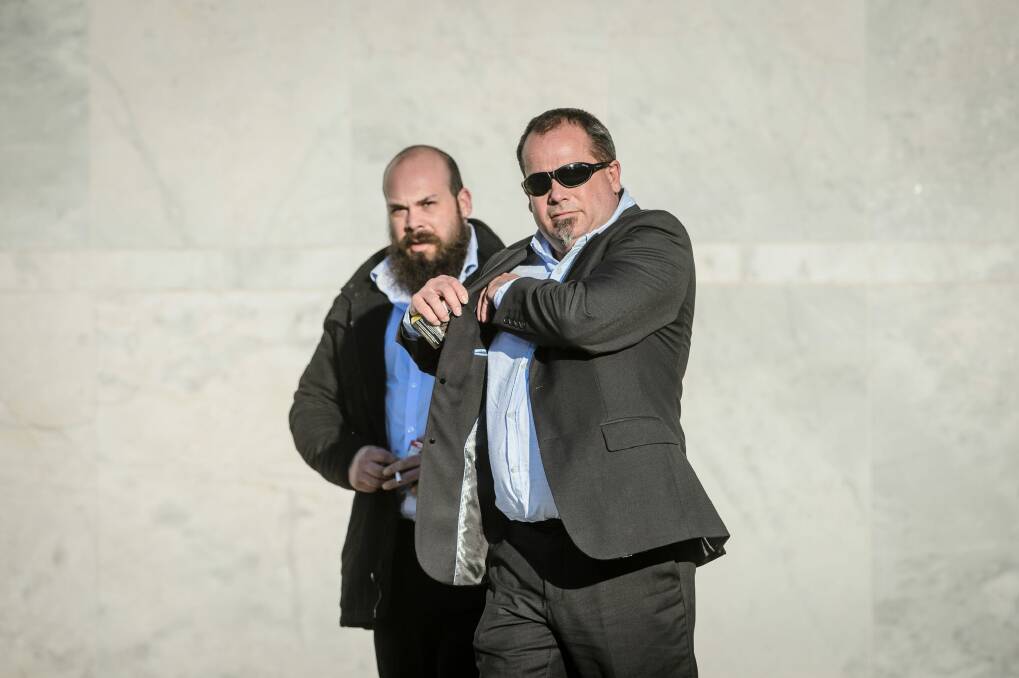 Christopher and Stephen Pattman leave the ACT Supreme Court on Wednesday. Photo: Sitthixay Ditthavong