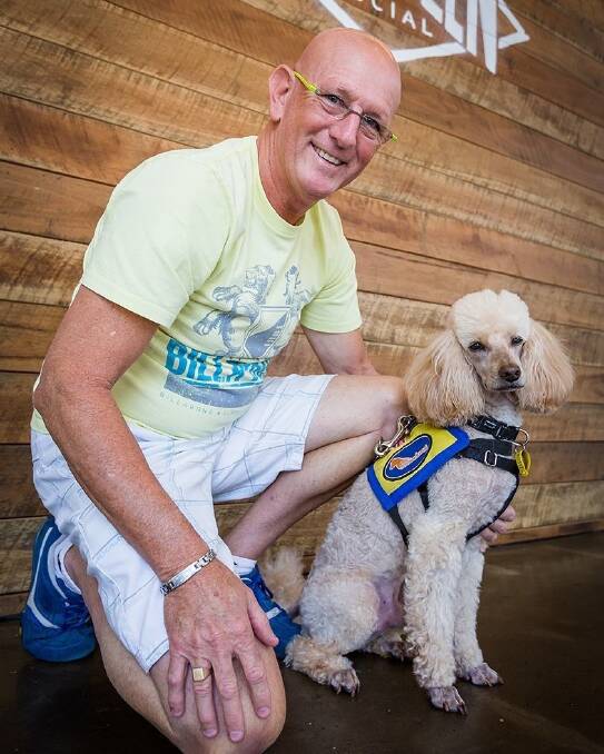 Greg Kelly, who has dementia, and his medical assistance dog Pep. Photo: supplied