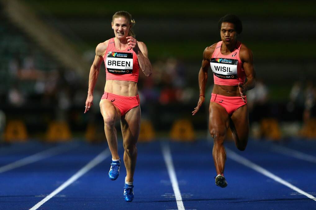 Melissa Breen wins the 100 metres national title on Saturday night with Hunter Reid the inspiration pinned to her bib. Photo: Getty Images