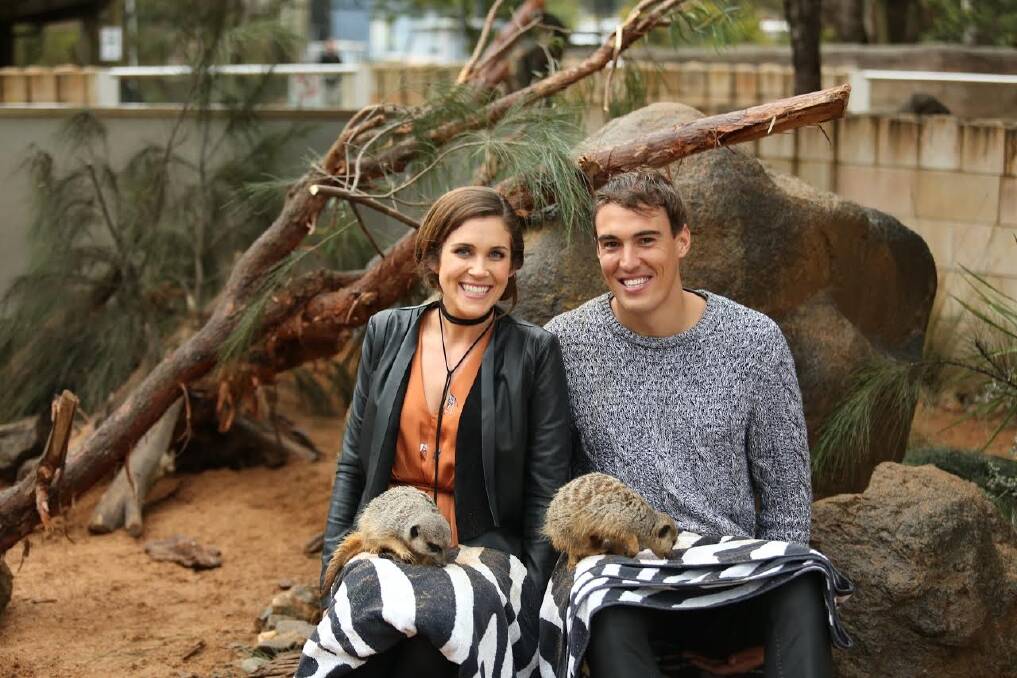 How cute. And we're not talking about the meerkats. <i>The Bachelorette</I>'s Georgia Love and Courtney Dober get cosy with the wildlife at the Canberra Zoo and Aquarium. Photo: Supplied