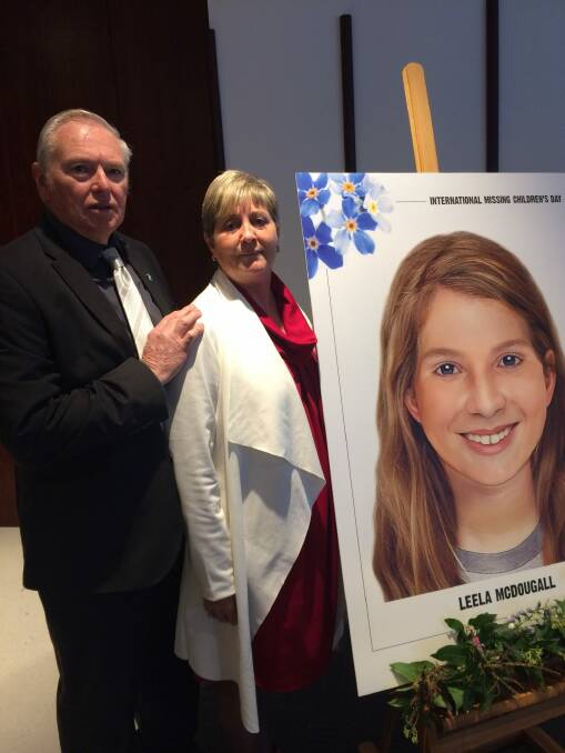 Victorian couple Jim and Cathy McDougall with an aged-progressed image of their missing grand-daughter Leela, who would now be 15. Leela and her mother, Chantelle, have been missing for almost a decade. Photo: Supplied