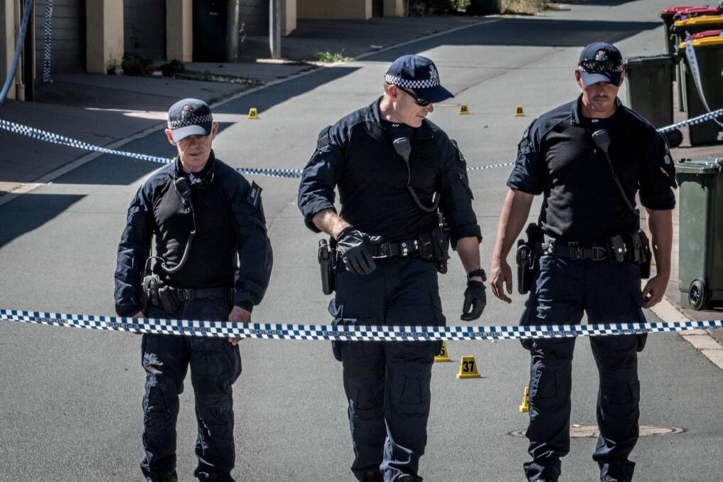 ACT police officers at the scene of the alleged murder in Gungahlin.  Photo: Karleen Minney