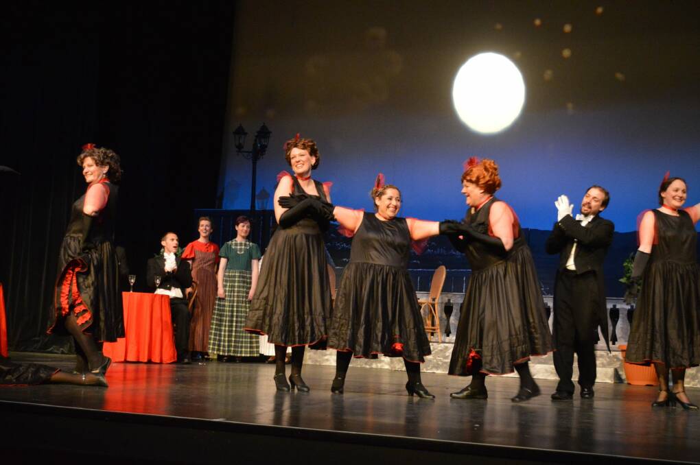 Louise Keast, left,  as the Widow and the Cancan girls in <i>The Merry Widow from Bluegum Creek</i>. Photo: Alison Newhouse
