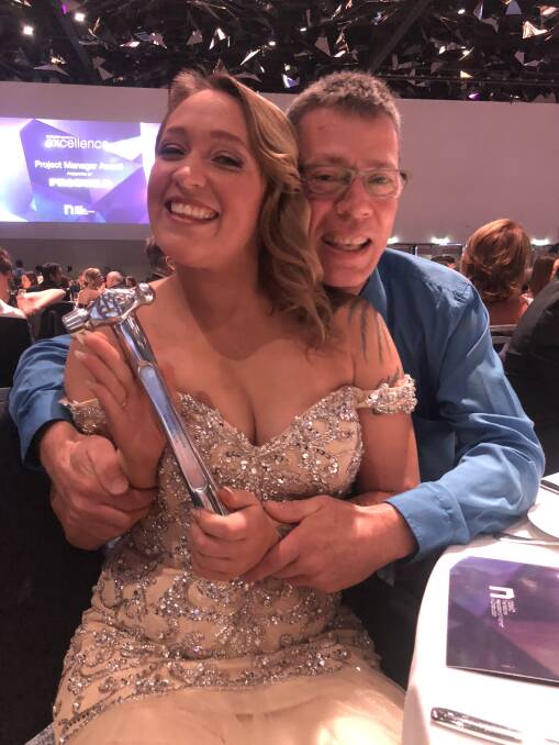 Taylor Perrin, with her dad John, at the NSW National Women in Construction Awards in Sydney. Photo: Supplied