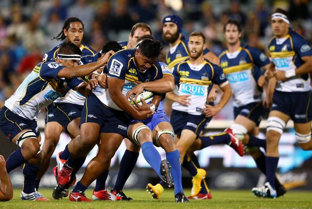 Ita Vaea of the Brumbies is tackled during the Brumbies' clash with the Force. Photo: Getty Images