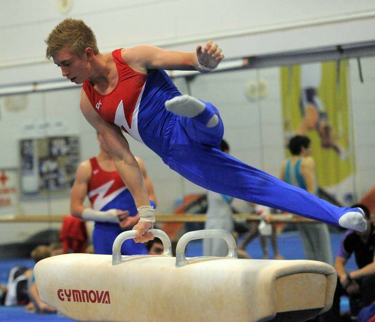 ACT State Gymnastics Championships at the AIS Gymnastics Training Hall. Competitor, James Bacueti, from the Woden Valley Gymnastics Club, performs on the pommel horse. Photo: Graham Tidy