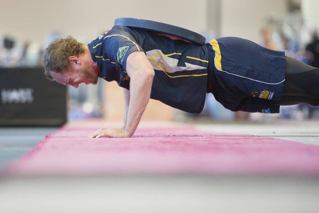 Push: Jesse Mogg during a gym training session for the Brumbies. Photo: Jay Cronan
