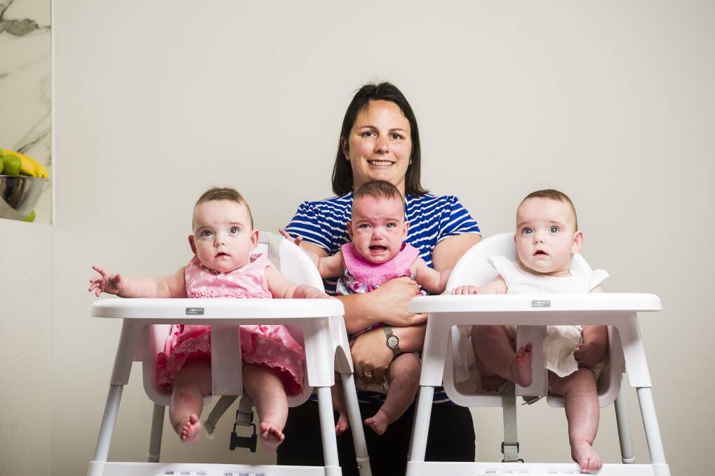 Emma Keen with her identical triplets (from left) Aleisha Keen, Maddilyn Keen, and Eloise Keen, all 7 months old.  Photo: Dion Georgopoulos