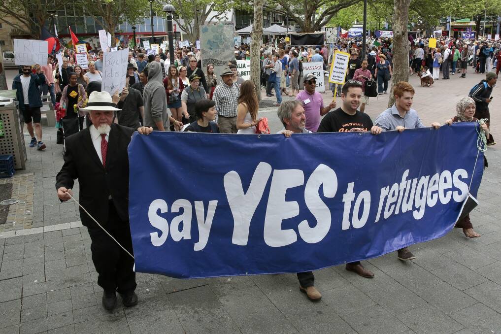 Hundreds march in support of refugees at a rally in Garema Place. Photo: Jeffery Chan