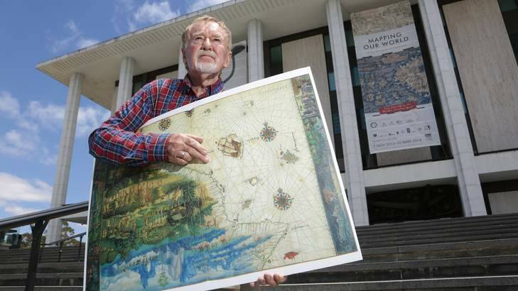 Historian and author Peter Trickett in front of the National Library of Australia with a replica of a recently acquired map that the National Library has excluded from the exhibition Mapping our World. Photo: Jeffrey Chan