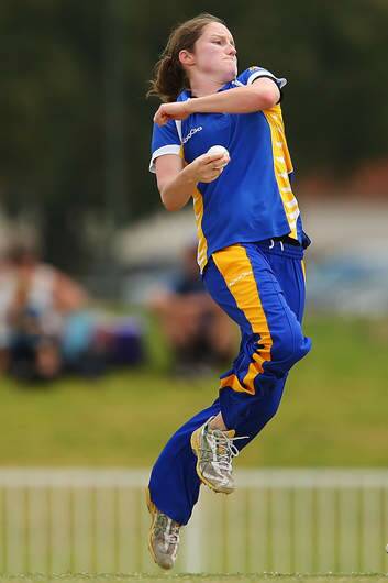 Rene Farrell of ACT bowls during a WNCL match between ACT and New South Wales at Robertson Oval. Photo: Brendon Thorne