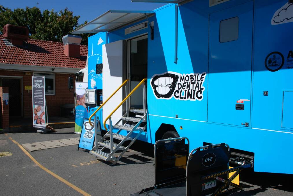 The ACT's first mobile dental centre, which began operating last year. A re-elected Labor government would deliver $3.94 million to buy and operate two more mobile centres. Photo: Supplied