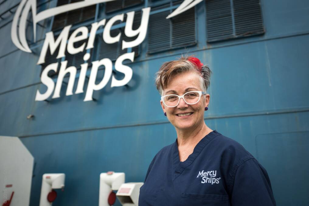 Therese Knight at work in the 80 bed hospital on board the 'Africa Mercy' shift docked in the West African nation of Benin. Photo: Timmy Baskerville