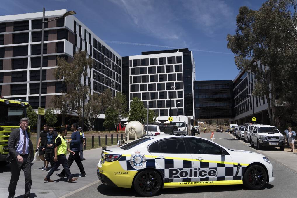 Police cars and ambulances outside Cooper Lodge at the University of Canberra on Wednesday, Photo: Lawrence Atkin