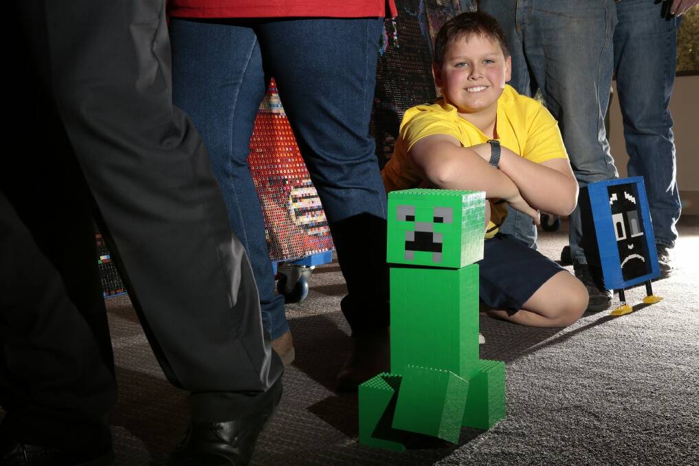 The wait almost over for Oliver McLauchlan, 11, of Wanniassa, for the Canberra Brick Expo at the Hellenic Club in Woden this weekend. Photo: Jeffrey Chan