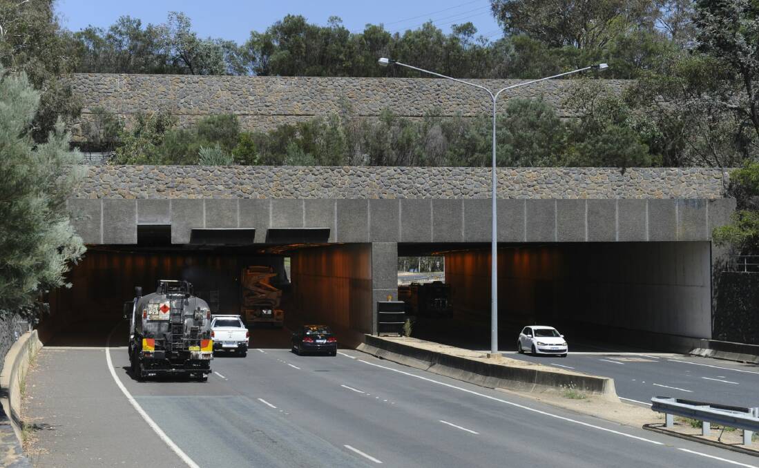 Motorists have been warned to stay away from the Parkes Way tunnel after a car fire on Saturday afternoon. Photo: Graham Tidy