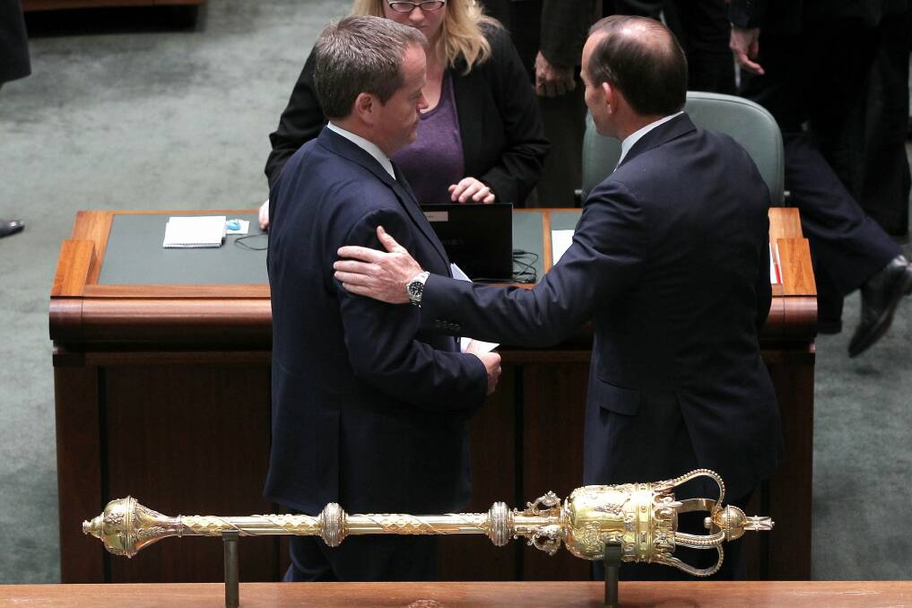 Bill Shorten and Tony Abbott in discussion after delivering statements on Malaysian Airlines flight MH17.  Photo: Alex Ellinghausen