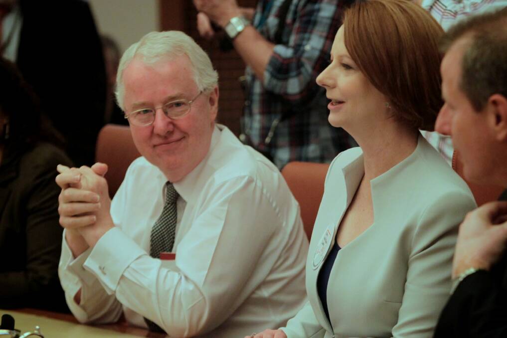 Australia's former top public servant Terry Moran with then prime minister Julia Gillard in 2011. Photo: Alex Ellinghausen