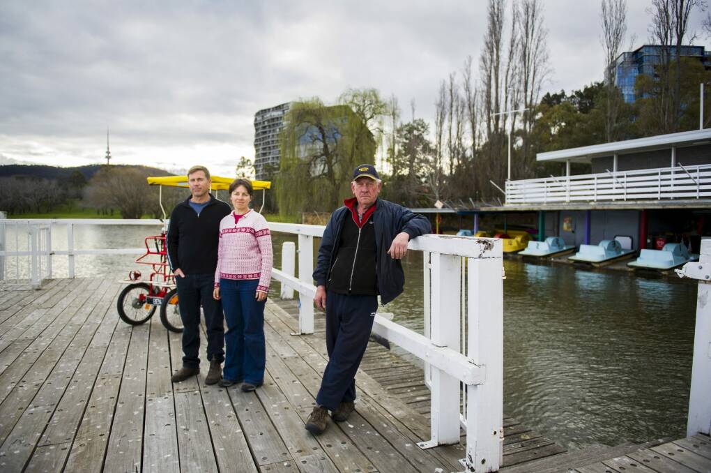 Mr Spoke bike hire owners Martin Shanahan and Jillian Edwards with boat hire business owner Jim Seears, are worried about how government redevelopment plans will effect their futures. Photo: Rohan Thomson
